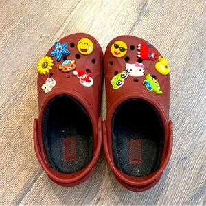 Crocs Kids 1 J3 sized lined clogs with charms